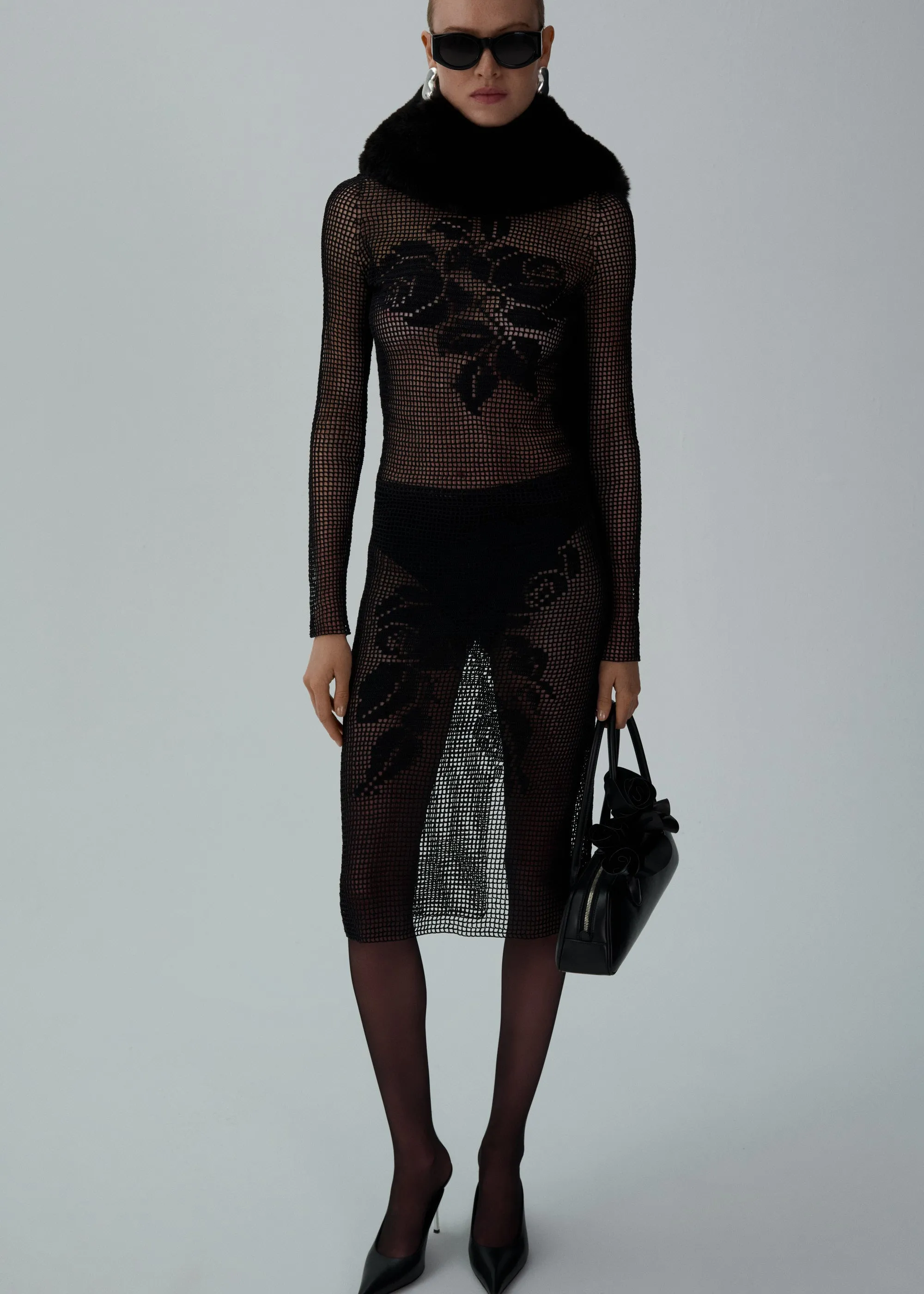 Lace-print crochet midi skirt in black